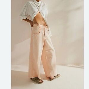 Free People Electric Feels Dropped Wide Leg Jeans We The Free Wash Peach color
